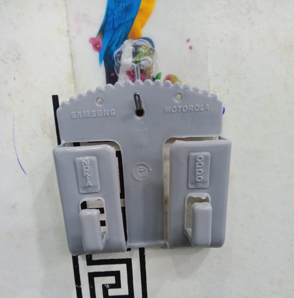 Multifunction Punch Free Wall Mounted Mobile Holder. Random Colors