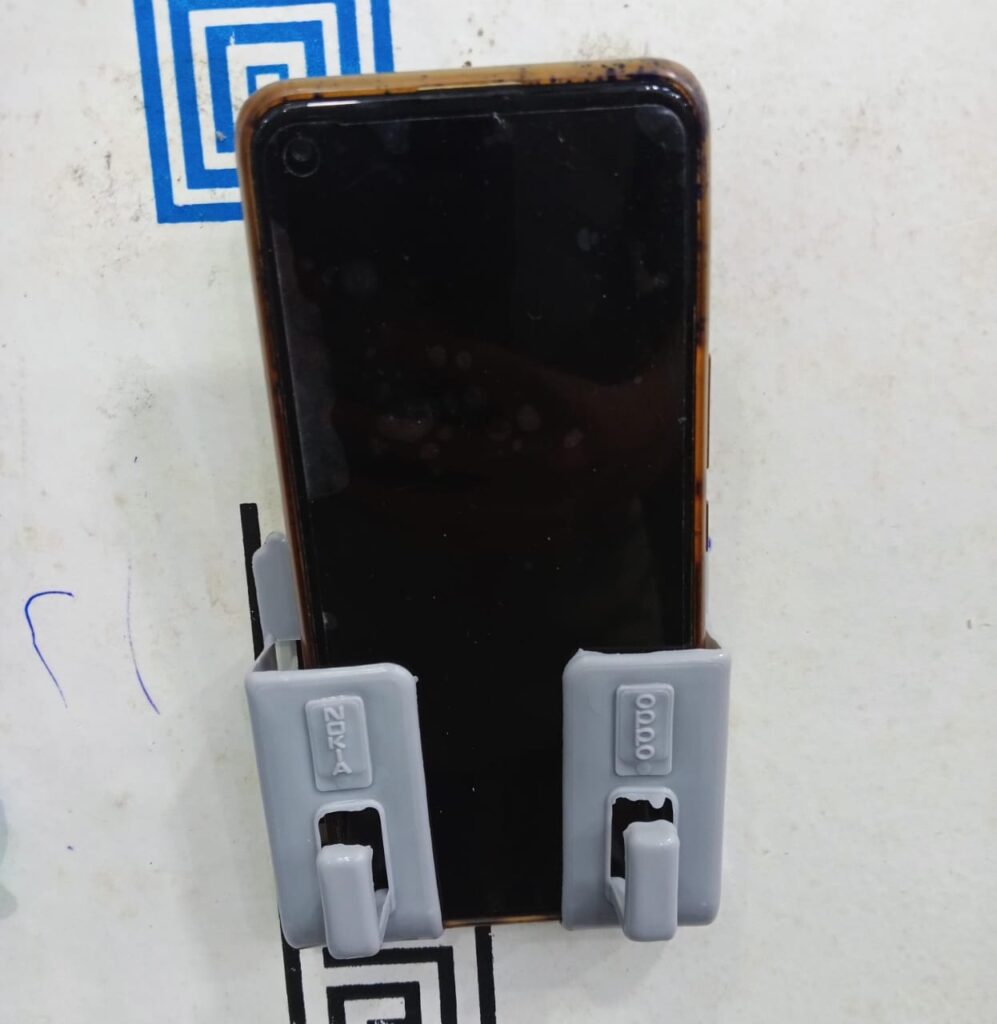 Multifunction Punch Free Wall Mounted Mobile Holder. Random Colors