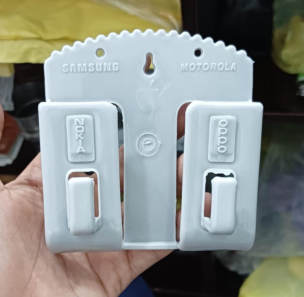 Multifunction Punch Free Wall Mounted Mobile Holder. Random Colors