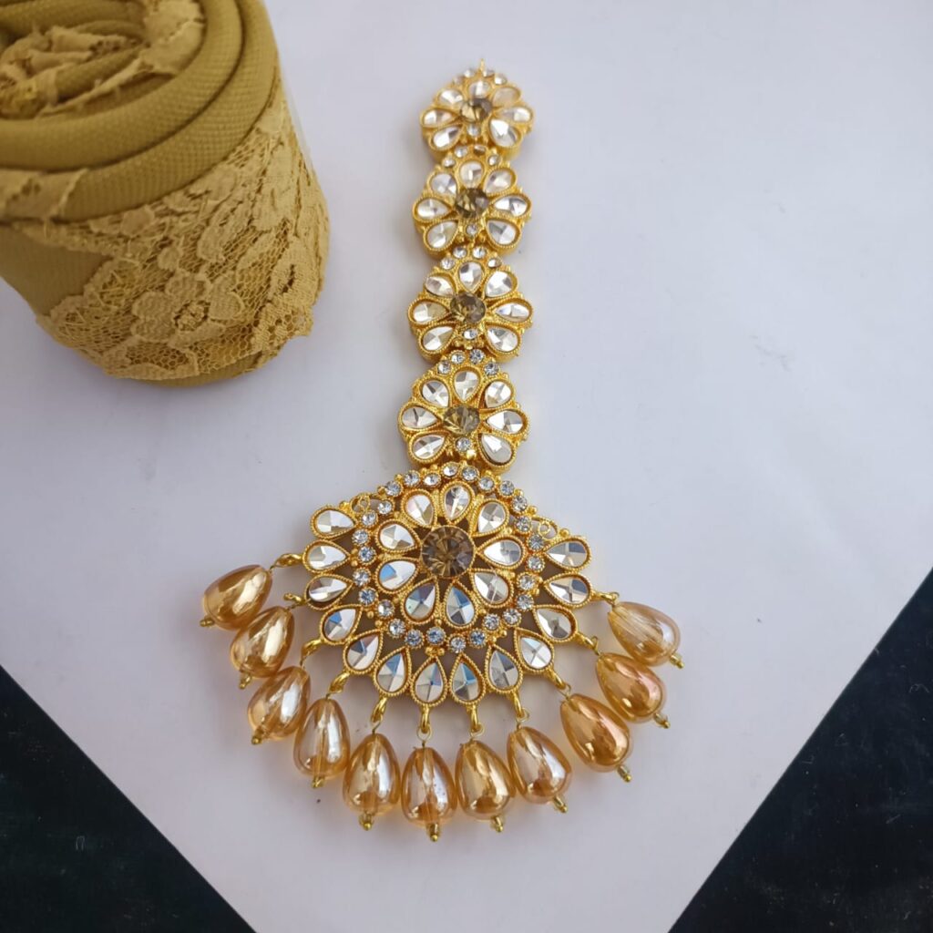 casting fine quality sheesha kundn bindia